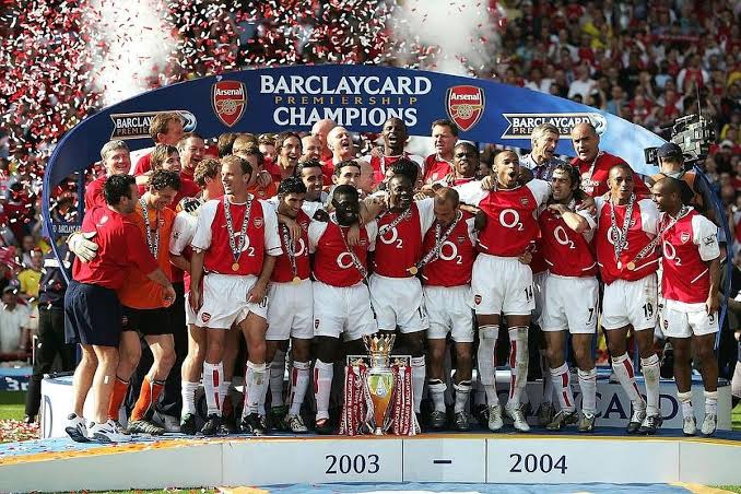 Arsenal | 49 matches | 2003-04